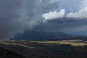 Dark clouds left and right of us